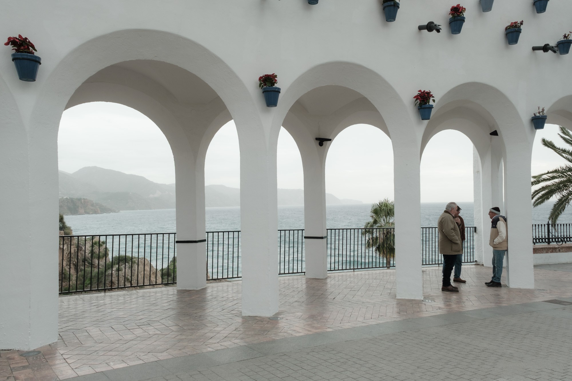 People enjoying the quiet and the sea in Nerja Andalusia