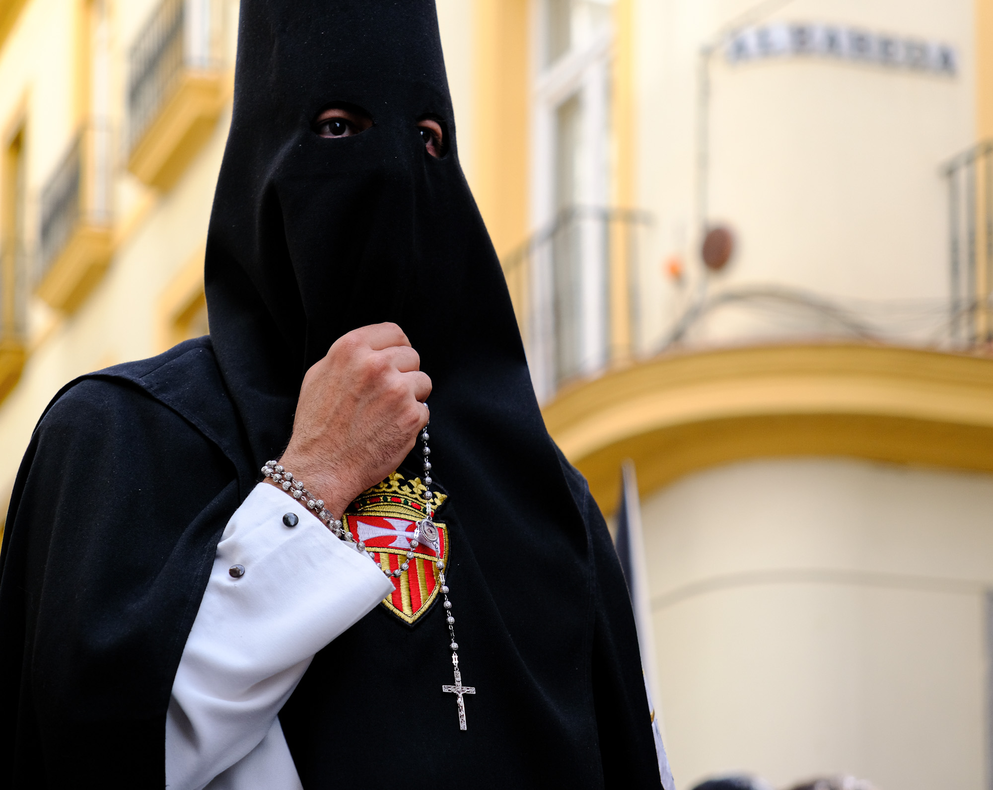 Close up of penitent during Semana Santa processions in Seville Andalusia