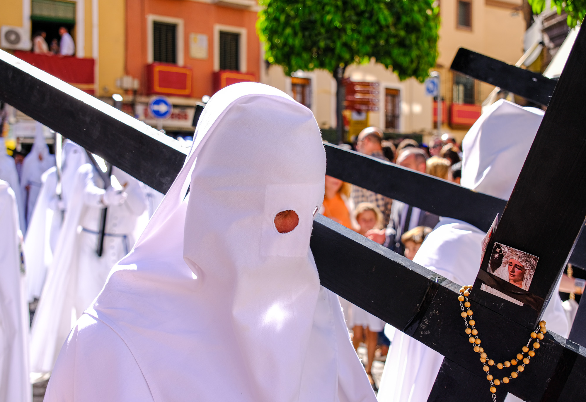 Close up of a penitent during Semana Santa processions in Seville