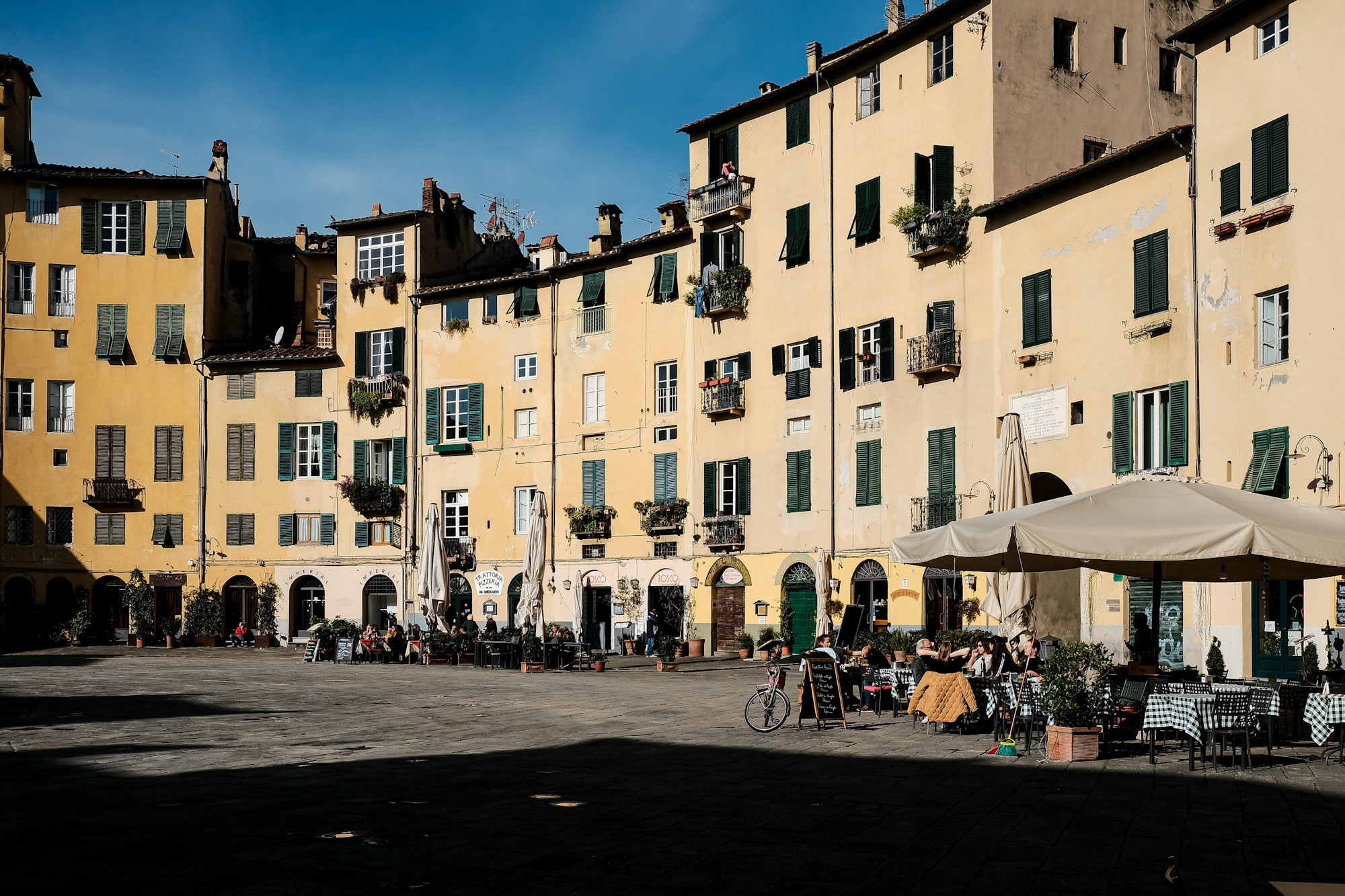 Relaxing in the main Piazza of Lucca Tuscany