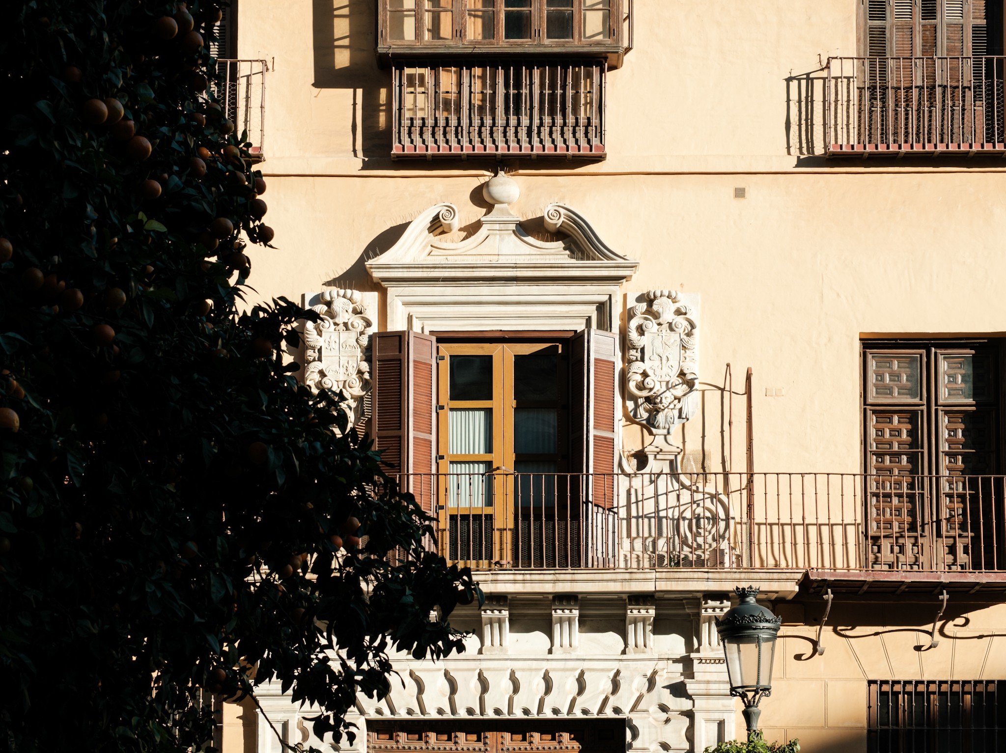 Building hit by morning sun in Malaga Andalusia