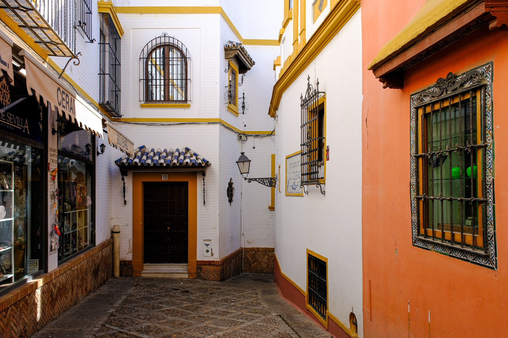 A maze of colored streets in Seville Andalusia
