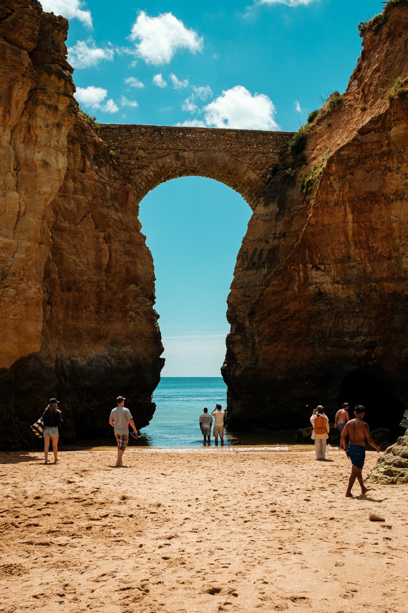 People relaxing on Praia dos estudantes Lagos Algarve Portugal